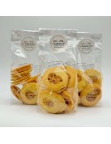 Romia's, een koekje, omhuld met chocolade & bresilienne